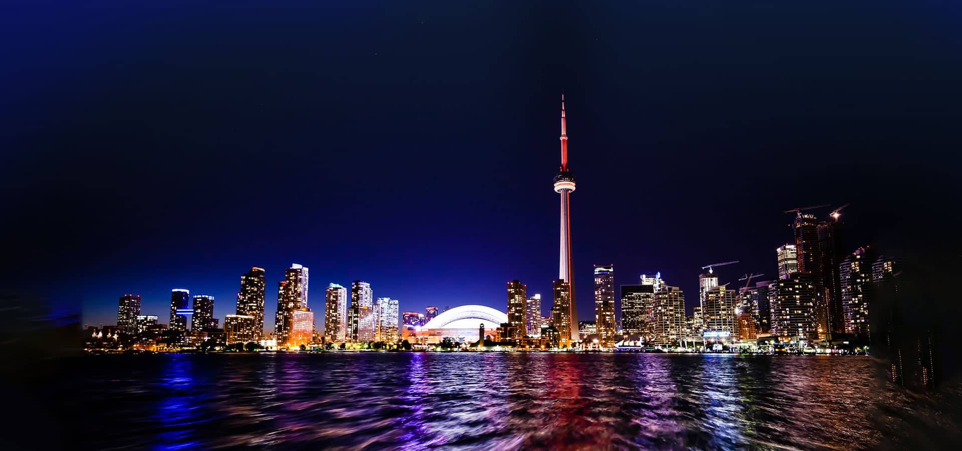 Toronto skyline background – Immigration & Visa Consulting in Canada